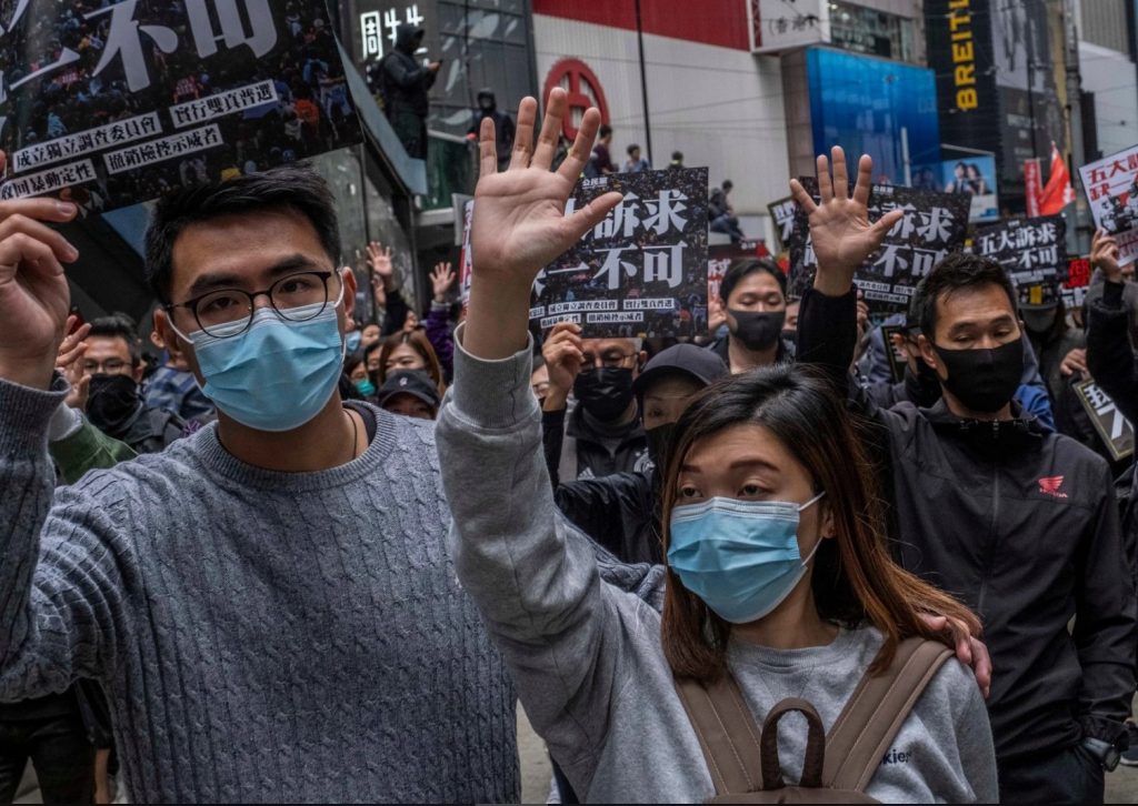 mystery viral outbreak hong kong, biological weapon attack hong kong, hong kong protests 2020,Hong Kong protesters wearing masks in January 2020