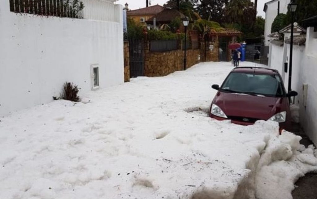 Car trapped in huge hail accumulation in Malaga on January 23 2020