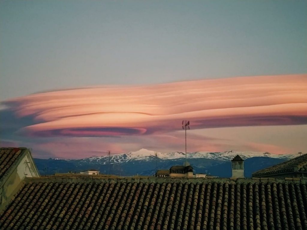 Gigantic lenticular clouds hover over Granada Spain on March 8 2020, Gigantic lenticular clouds hover over Granada Spain on March 8 2020 pictures, Gigantic lenticular clouds hover over Granada Spain on March 8 2020 video