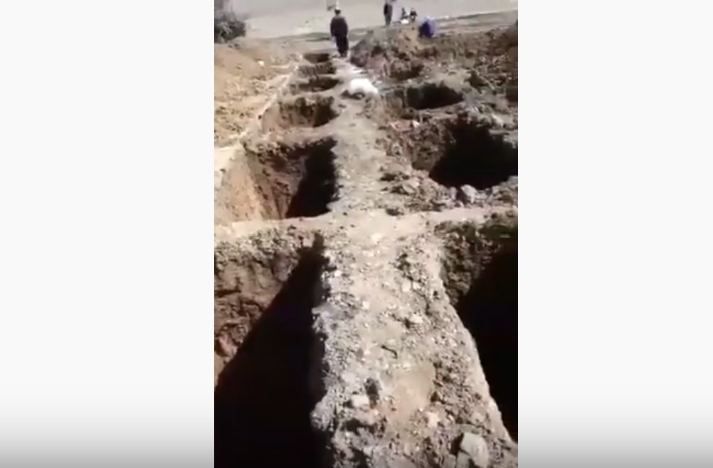 Iran digs mass graves for coronavirus dead near Qom, iran coronavirus mass graves, iran coronavirus death from alcohol poisoning