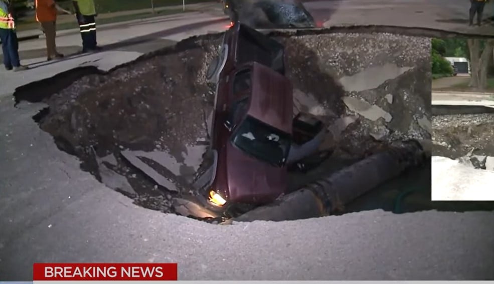 Driver crashes his truck into massive sinkhole in St. Louis, giant sinkhole truck st louis