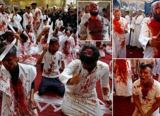 Devout Shiite Muslims are left covered in blood as they flagellate themselves with swords and chains during mourning procession to mark day of Ashura in Iraqi holy city of Najaf