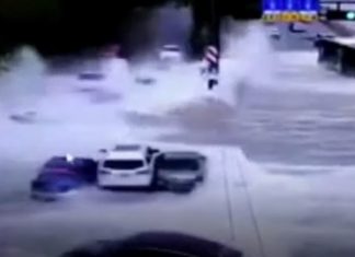 gigantic tidal wave crashes on road in china video, Monster tidal waves crash on road and sweep away vehicles in China
