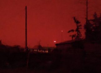 Day turned into night earlier today in several areas of Yakutia, with the sky turning orange and red and the Sun getting completely blocked by smog