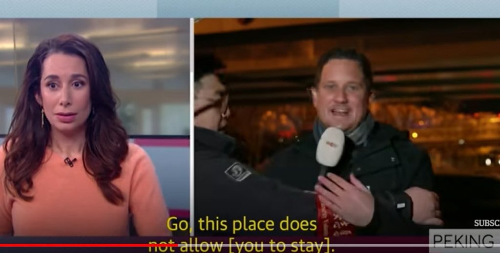 Chinese official drags Dutch reporter away during Olympics live report