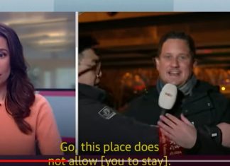 Chinese official drags Dutch reporter away during Olympics live report