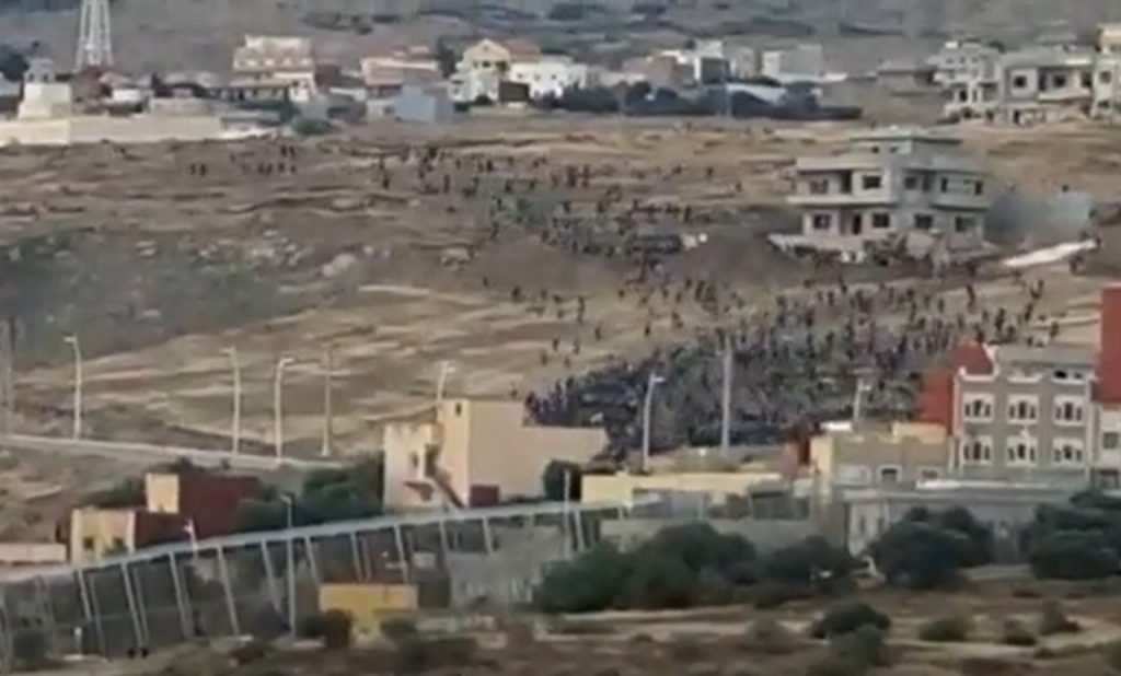 Hundreds of migrants storm Spain's Melilla enclave