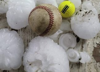 giant hail damages cars and homes in Beatrice, Nebraska
