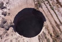Giant sinkhole opens up out of nowhere in Chile mining city