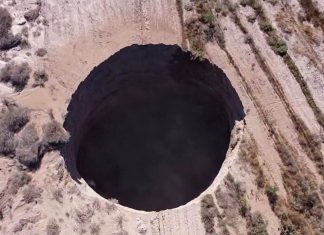 Giant sinkhole opens up out of nowhere in Chile mining city