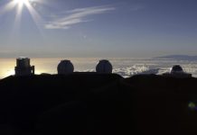 The sun sets behind telescopes on July 14, 2019, at the summit of the Big Island's Mauna Kea in Hawaii. For over 50 years, telescopes have dominated the summit of Mauna Kea, a place sacred to Native Hawaiians and one of the best places in the world to study the night sky. That's now changing with a new state law saying Mauna Kea must be protected for future generations and that science must be balanced with culture and the environment.