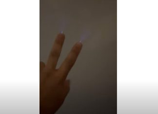 Mysterious glow on fingers during thunderstorms in Saudi Arabia. Picture via Youtube video
