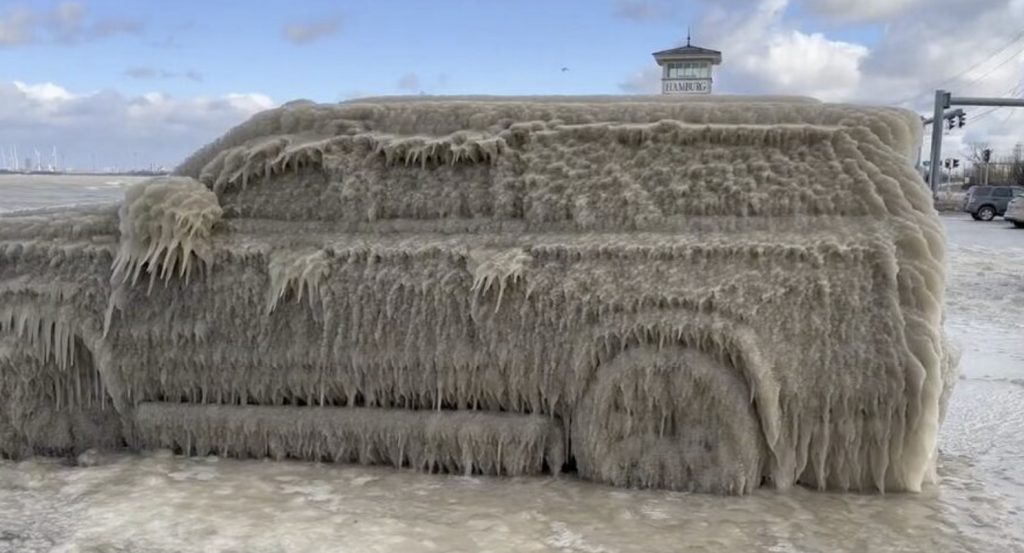 Car encased in ice after storm at Hamburg, Lake Erie, New York