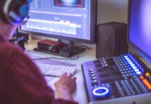 The Intricate Science of Sound Design in Digital Platforms Video,Editing,,Recording,And,Cutting,Room,With,Monitors,And,Sound