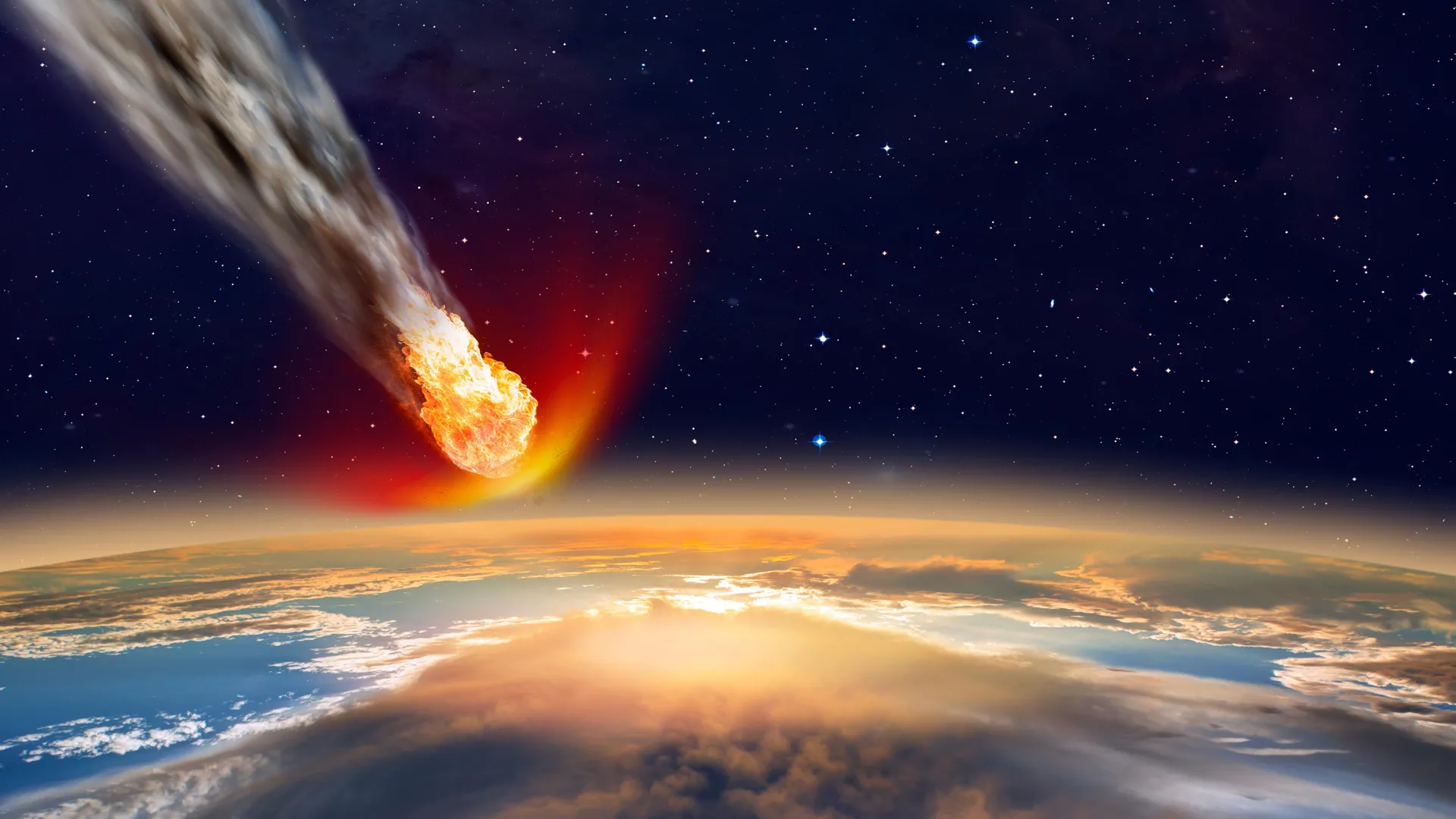 Artist’s illustration of a fiery asteroid entering Earth's atmosphere before impact — similar to the 11-million-year-old event that left tektites in South Australia