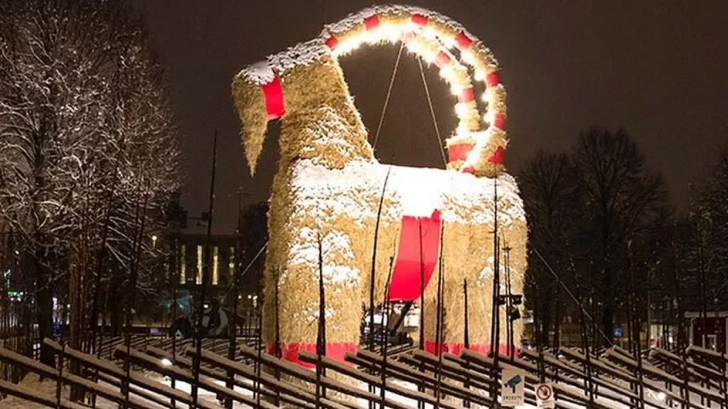 The Gävle Goat in Sweden illuminated at night, a giant straw Christmas goat watched worldwide via live webcam