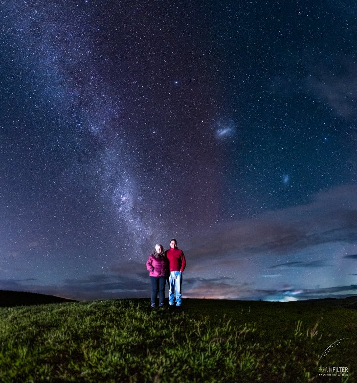 Night sky photo showing a faint purple aurora-like band over southern Brazil inside the South Atlantic Anomaly