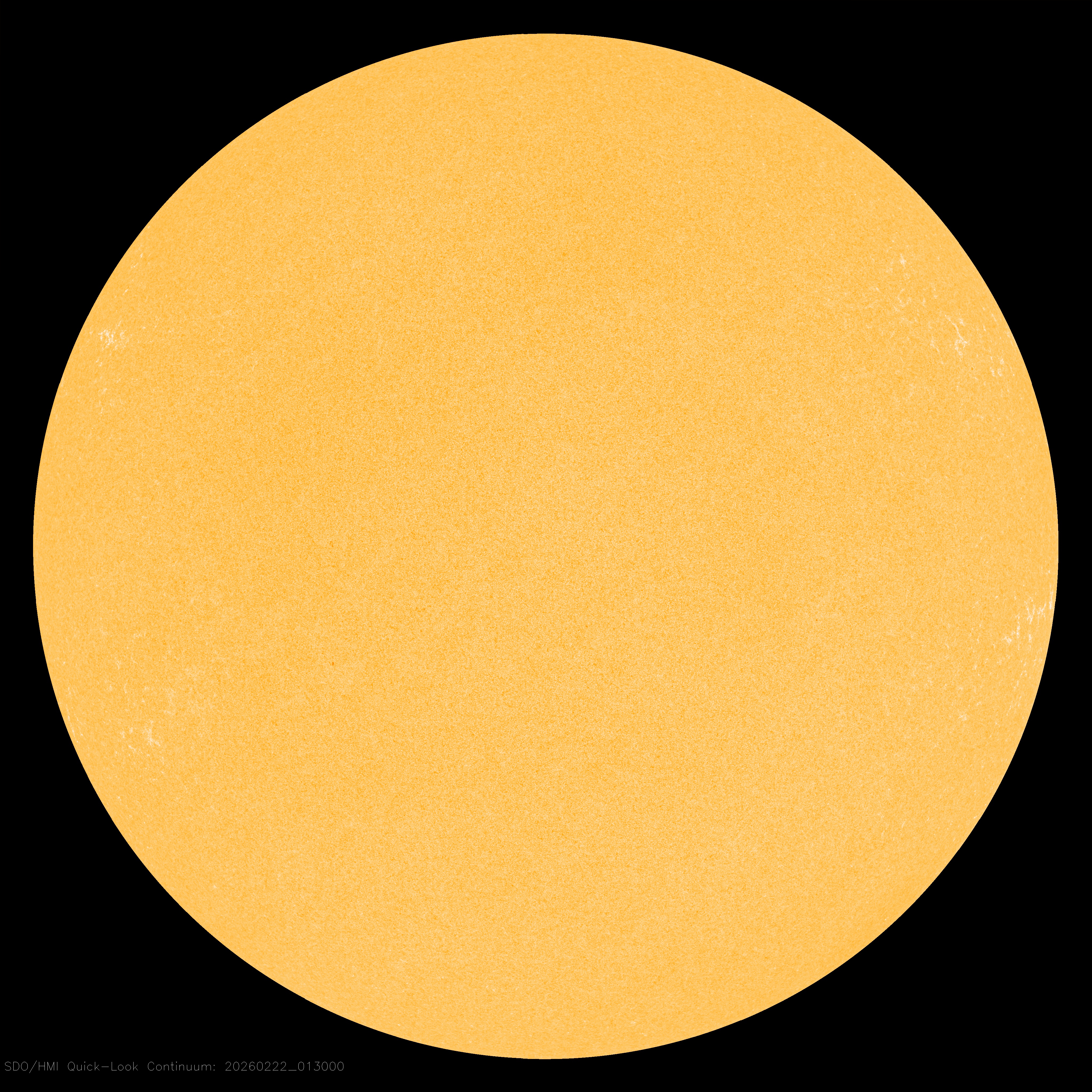Blank solar disk with no visible sunspots during Solar Cycle 25 on February 22, 2026